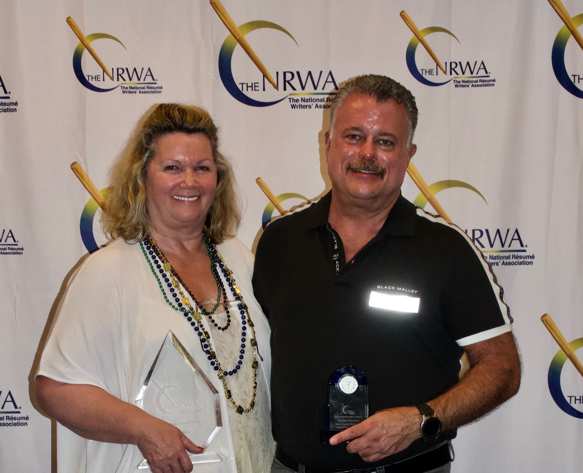 Mary Jo King, Vivian Belen Award Winner, with Tom Powner, Industry Hero Award Winner